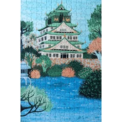 Osaka Castle puslespil af Ellen G�zel-Niehoff med slottet og slotshaven malet i bl� og gr�nne nuancer.
