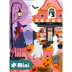 Halloween med en heks, sp�gelser og gr�skar foran et �de hus.